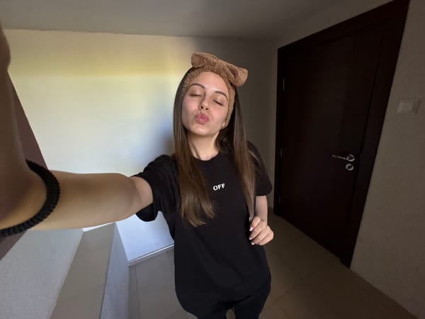 Woman documents morning routine through selfies in Bulgarian home