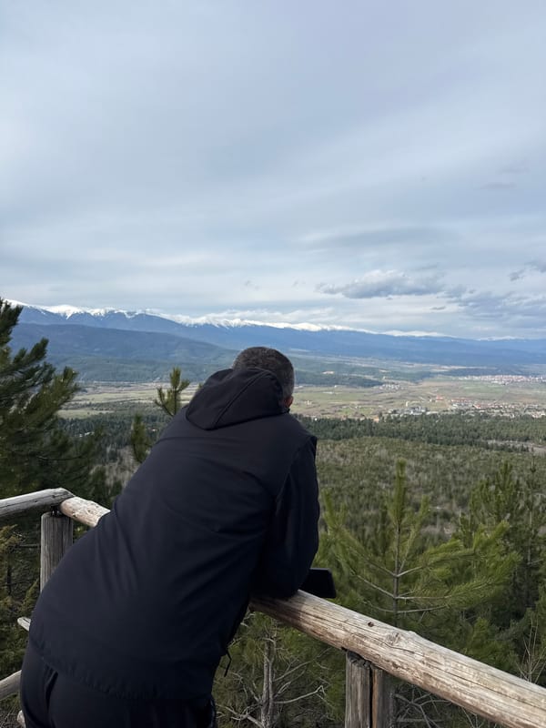 Visitors gather at Razlog scenic overlook for valley views