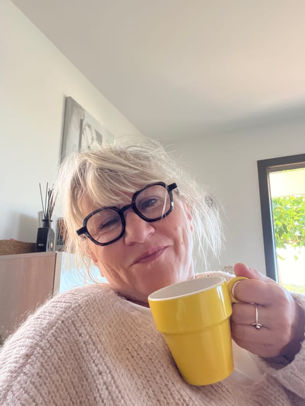 Woman photographed indoors in Chambœuf, France Saturday morning