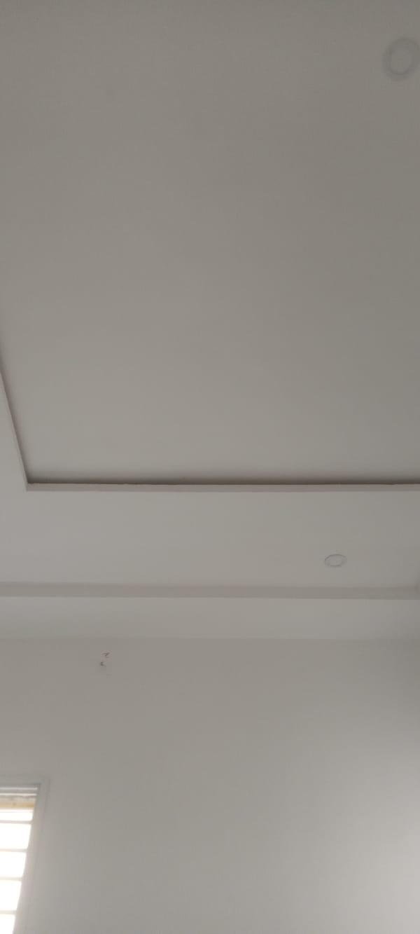 Interior room features documented: white walls, barred windows, recessed lighting