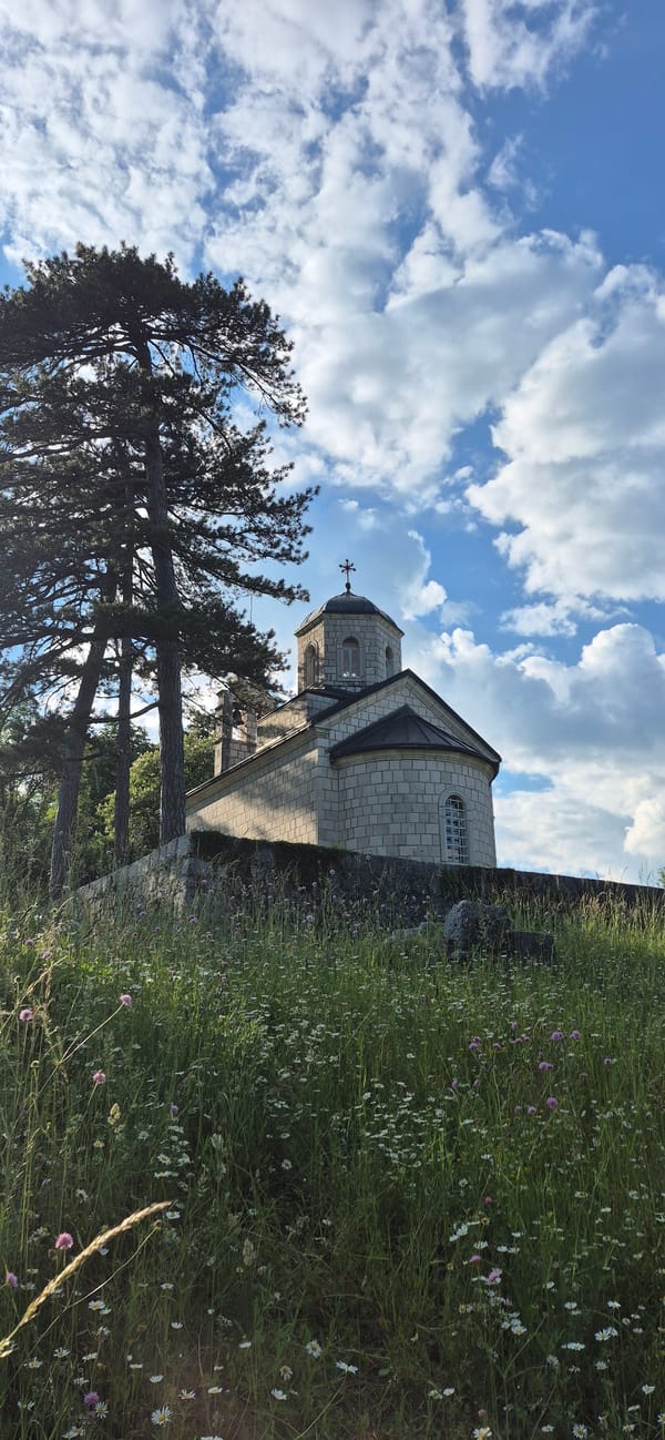 Tourist documents traditional culture and landmarks in Cetinje, Montenegro