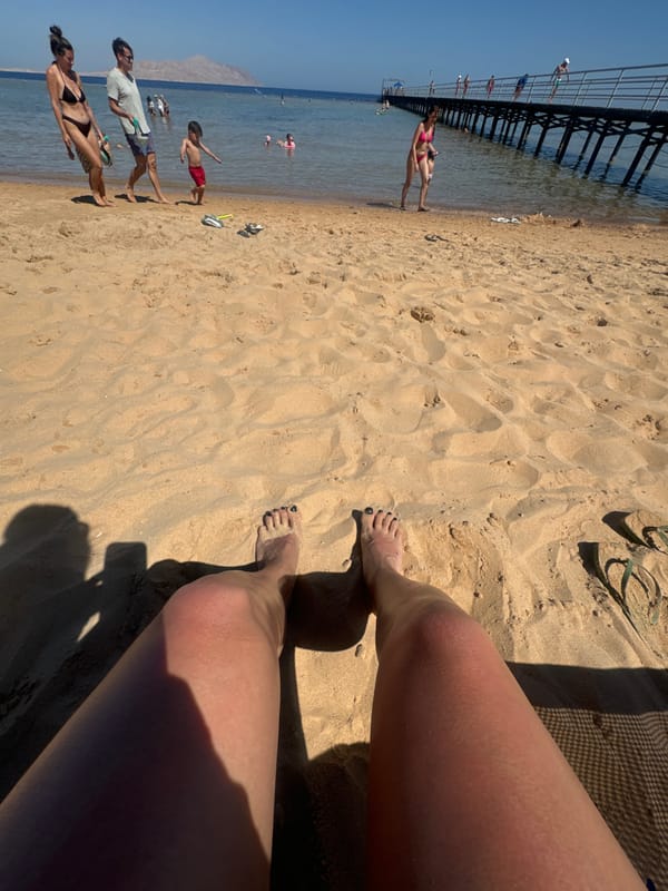 Beach moment captured from personal perspective in Sharm El Sheikh