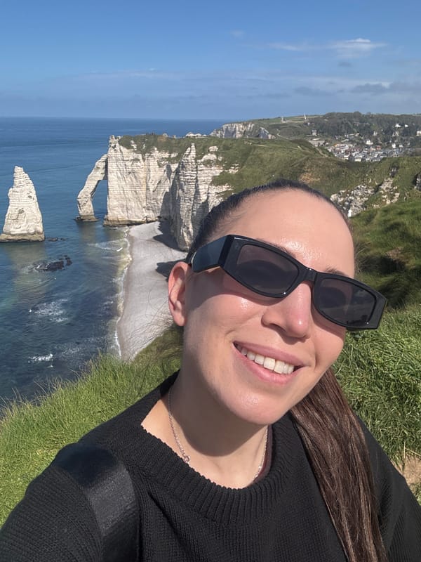 Tourists enjoy sunny day at Étretat's dramatic chalk cliffs