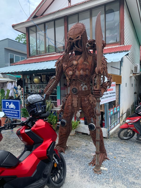 Tourist explores Baan Plai Laem temples, shops, coastal views