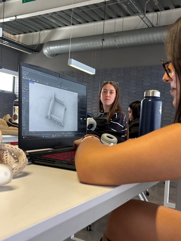 Students collaborate on laptop projects in Mexico City study area