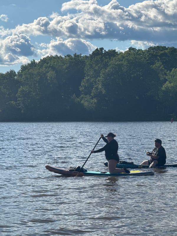 Paddleboarding on the Ottawa River on a clear summer evening