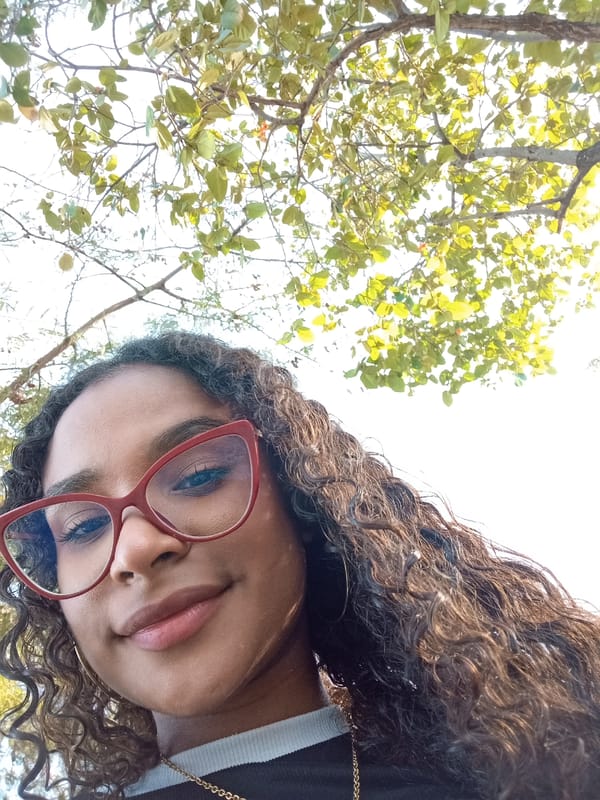 Woman photographed under tree canopy in Juan Griego