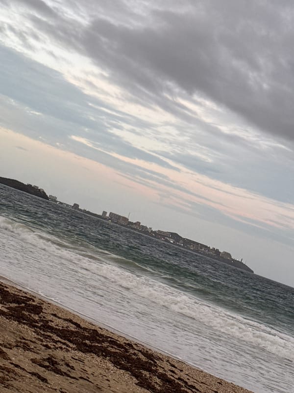 Photographer documents overcast beach scene in Porlamar, Venezuela