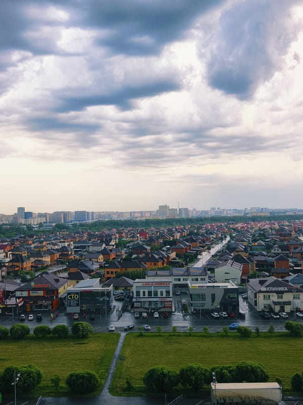 Aerial views document rainy day across Tyumen residential districts
