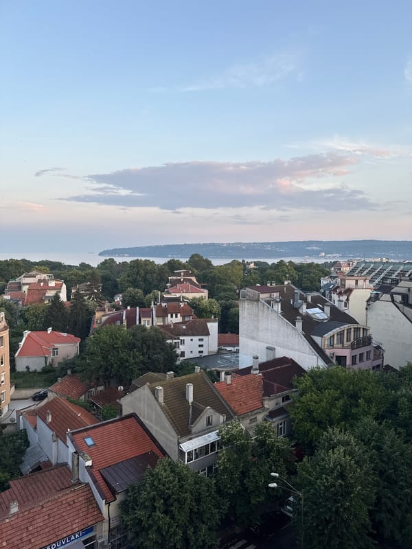 Varna rooftops and Black Sea horizon at golden hour