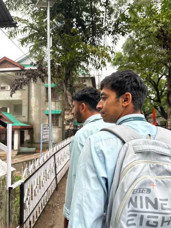 Students in uniform around a government college campus