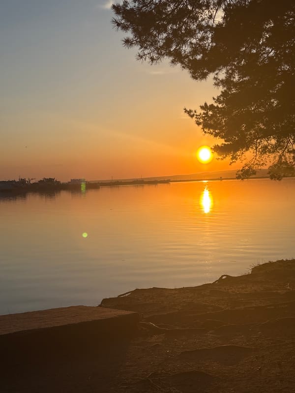 Sunset reflection captured at waterfront location
