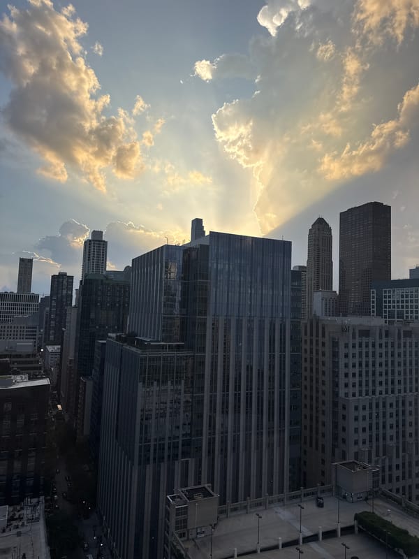 Chicago skyline glows at sunset on a busy July evening