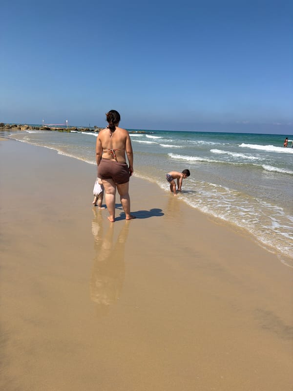 Morning beach day in Bat Yam — paddleboarding, swimming, sun