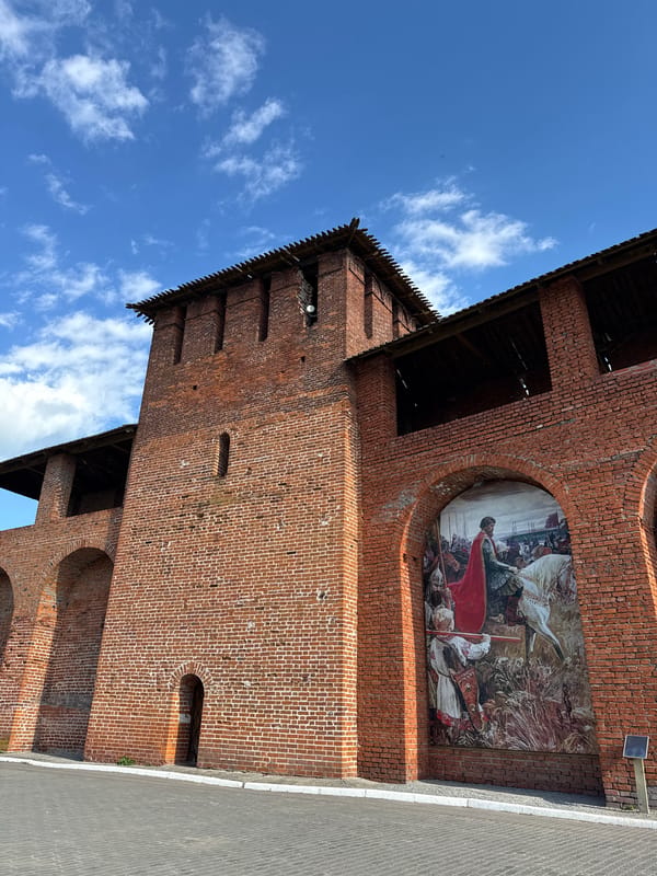 Exploring a Russian Orthodox monastery complex on a clear afternoon