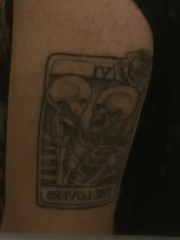 Skeletal tarot tattoo documented on forearm in Elena, Bulgaria