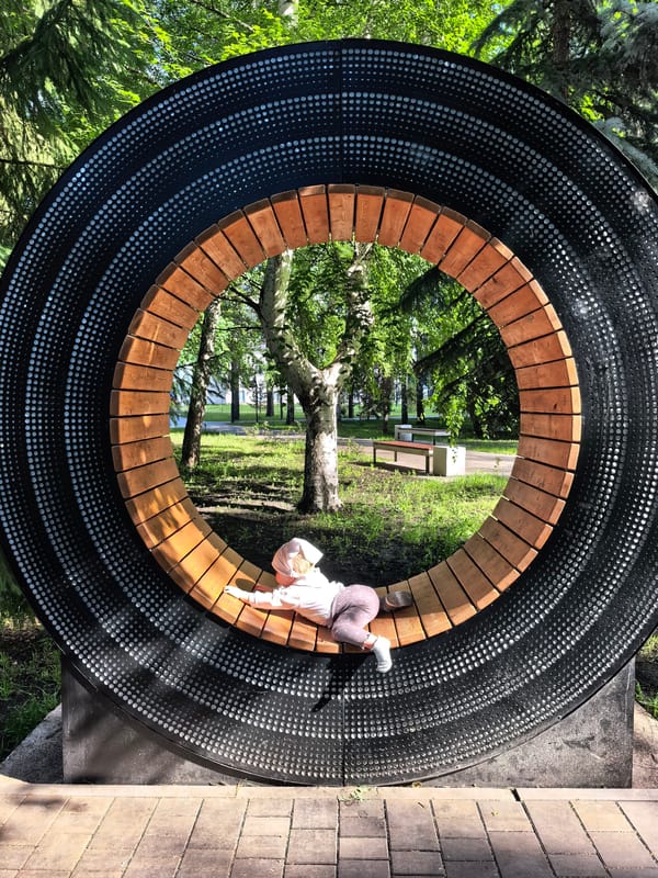 Afternoon at a Sterlitamak park: fountains, paths, and sandpit play