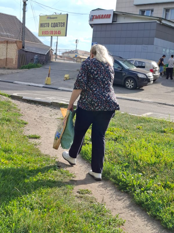 Sidewalks, scooters, and a supermarket trip on a partly cloudy day