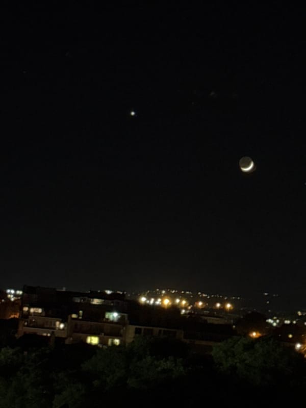Crescent moon, bright celestial object observed over Varna, Bulgaria