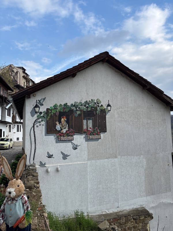 Tourist documents historic monuments and street art in Veliko Tarnovo