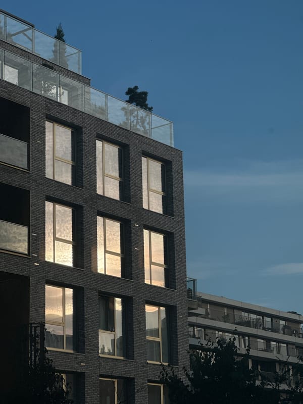Amsterdam apartment building, inside and out on a sunny afternoon