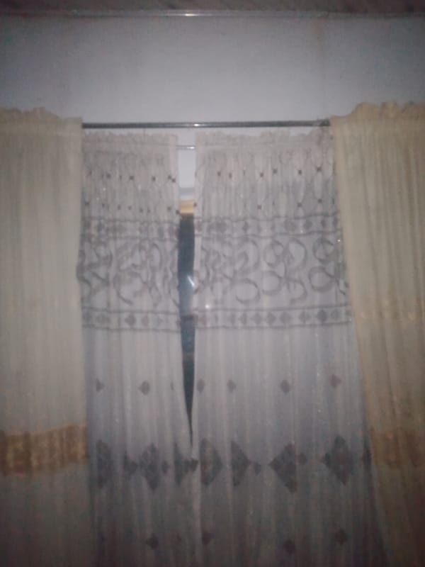Indoors in Jauro Yinu: clothing, fabric, and everyday objects