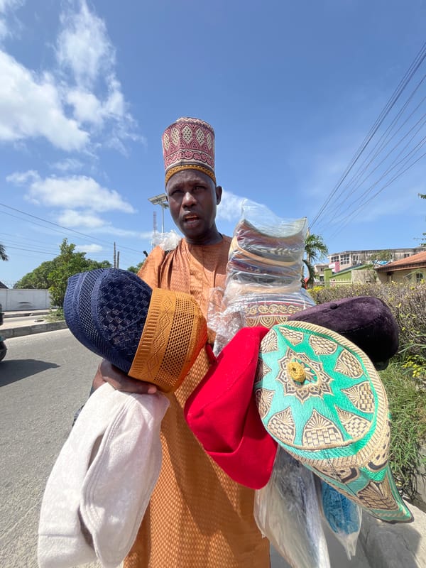 Street vendors conduct roadside business in Ado, Nigeria