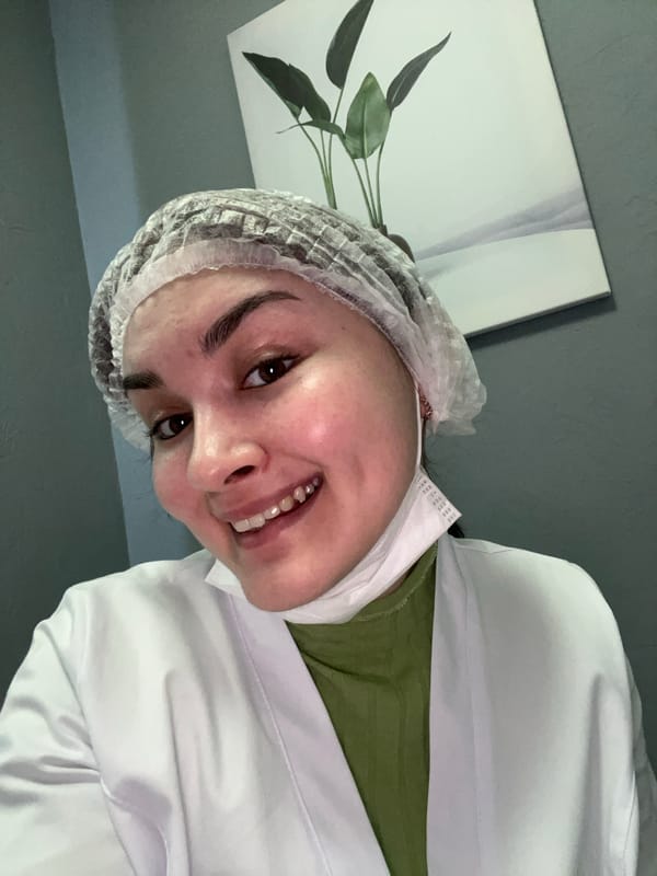 Healthcare worker takes selfies in medical attire in Russia