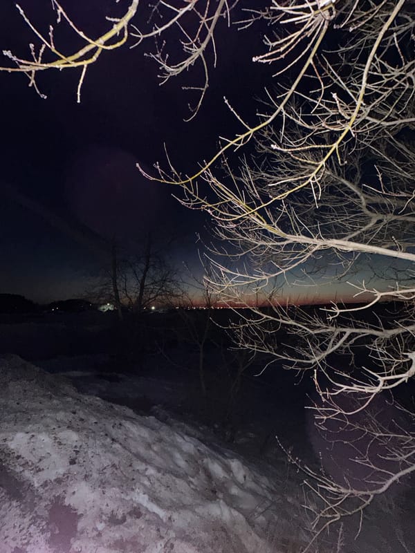 Winter sunset captured across snowy Chaikovsky, Russia landscape