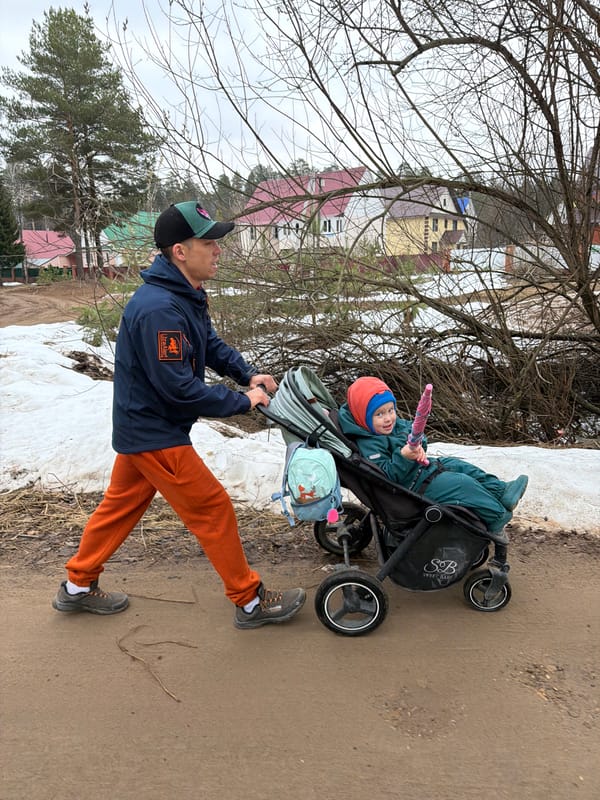 Family outing documented in Chaikovsky woods with selfies, stroller walks