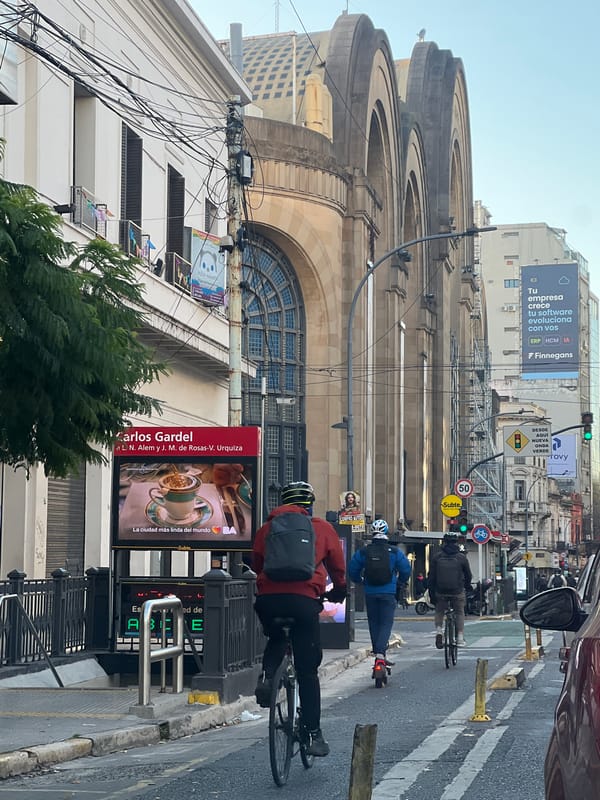 Cyclists ride through central Buenos Aires near Retiro terminal