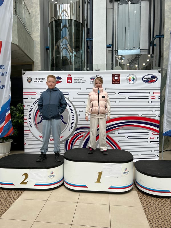 Children celebrate on winners' podium in Russian town
