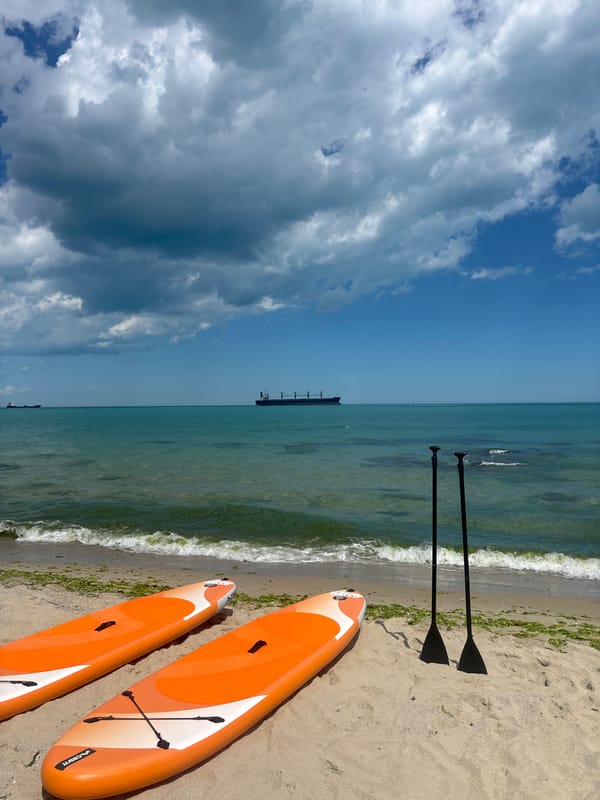Paddleboard setup on Varna beach with turquoise sea backdrop