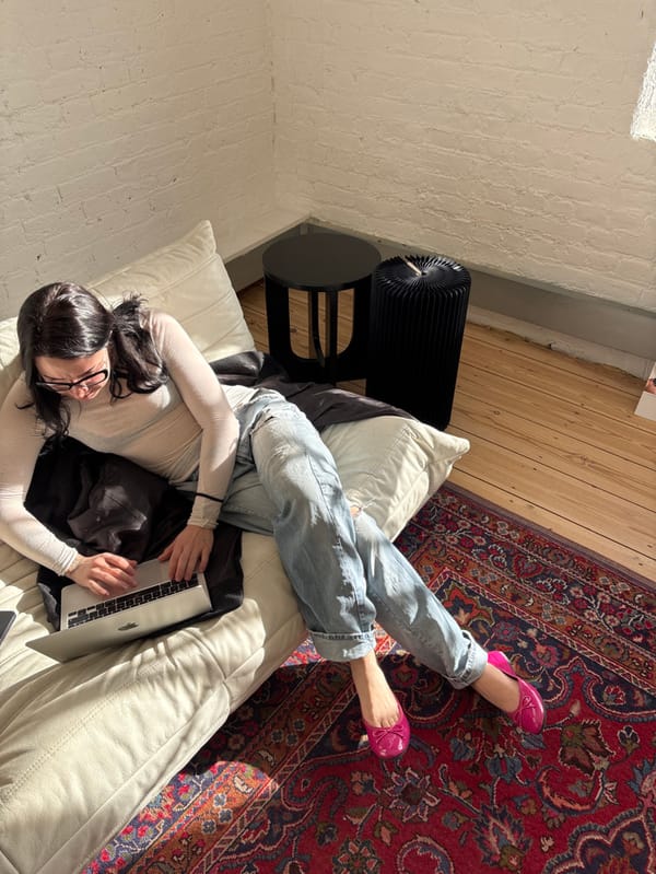 People documented in London studio space during morning hours