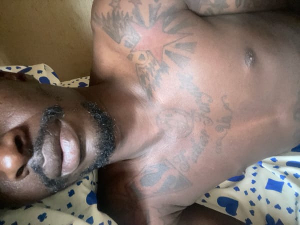 Morning scenes documented in Jos: man resting, parked vehicle