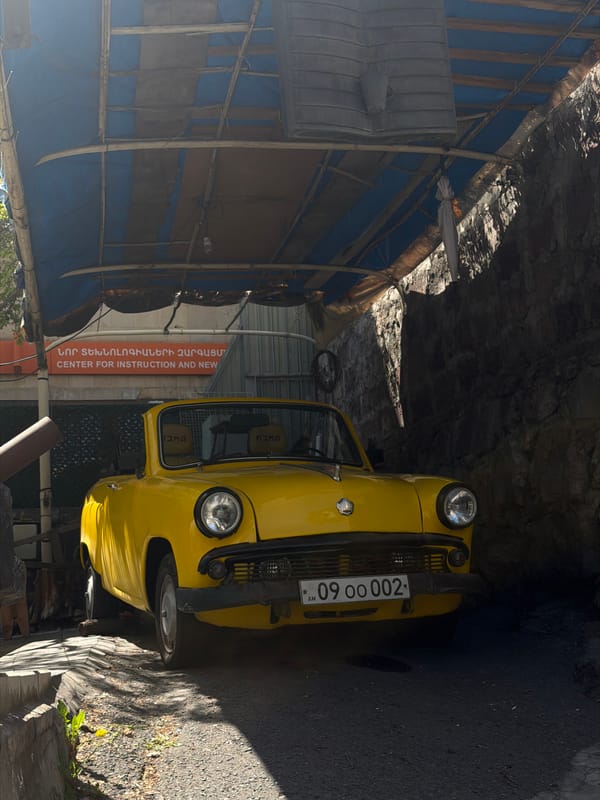 Yellow vintage car spotted parked in Yerevan