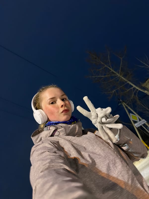 Woman takes nighttime selfies in snowy Berezniki streets