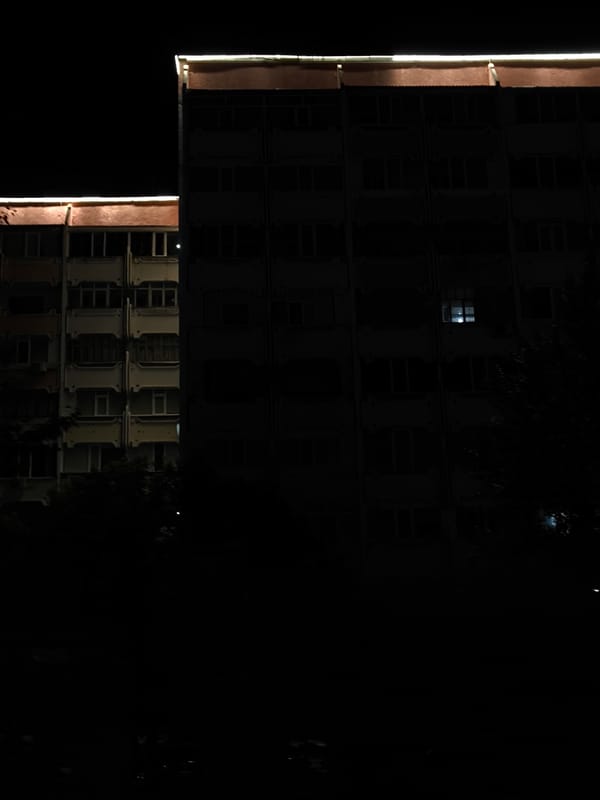 Kostanay at night: mosques, apartments, and city streets