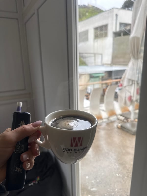 Morning coffee and vaping moment captured in Tbilisi