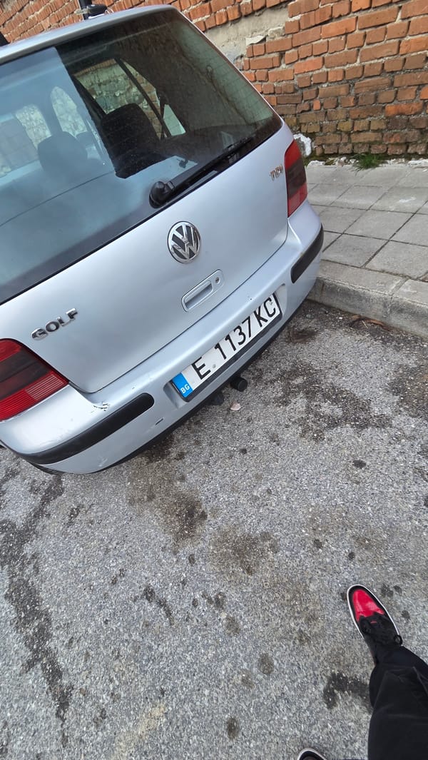 Silver Volkswagen Golf parked on street in Bania, Bulgaria