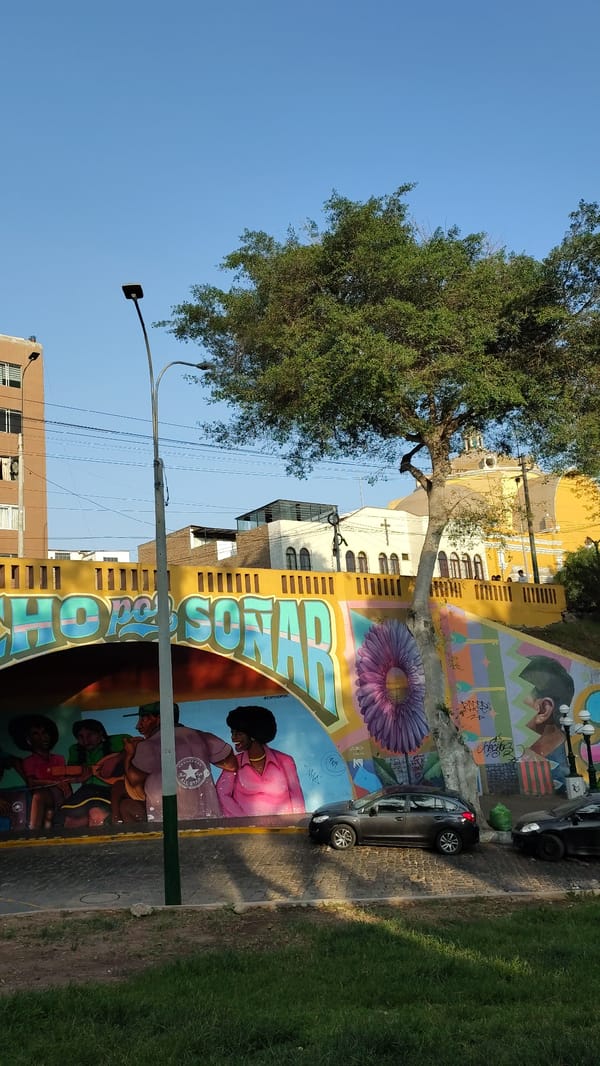 Evening documentation of everyday Barranco street life and murals