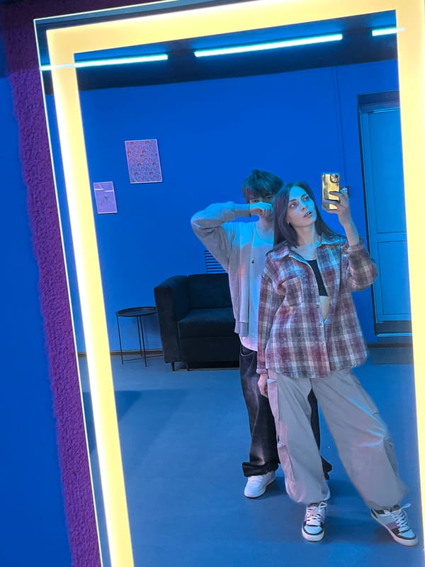 Young people take selfie in colorful room in Krasnoyarsk