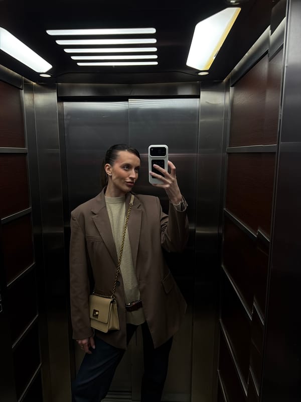 Woman takes elevator selfie in Budva, Montenegro