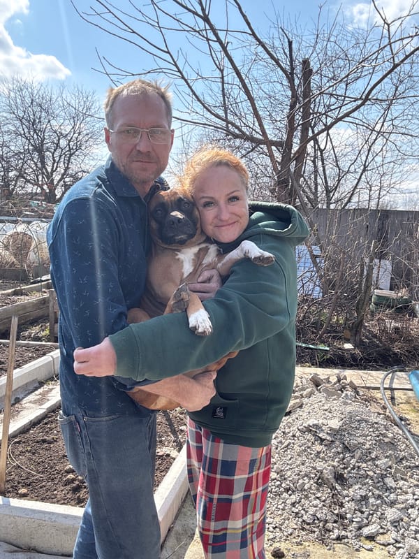 Morning photo session with couple and dog in Chaikovsky backyard