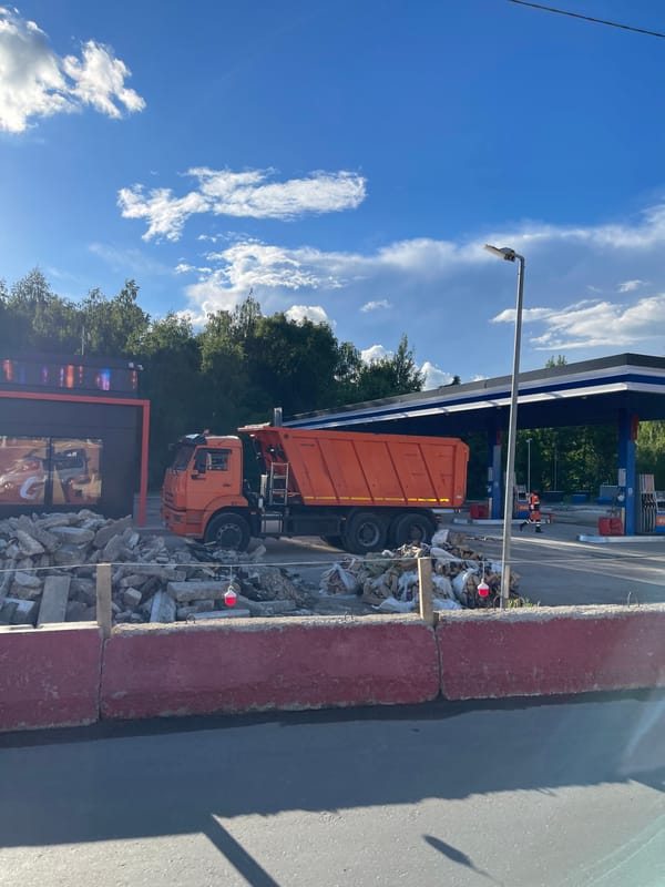 Moscow traffic scenes with Yandex taxi, construction activity captured