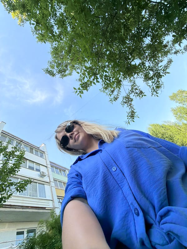 Woman documents spring afternoon with selfies and flowers in Chaikovsky