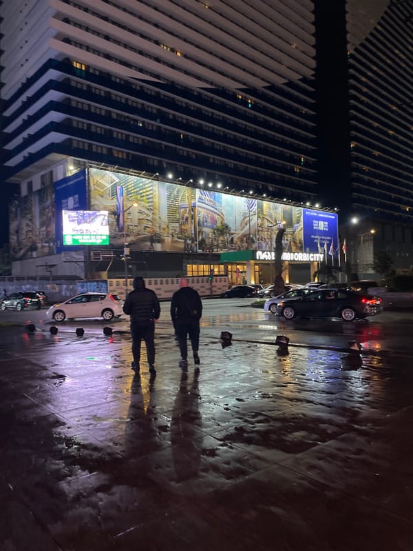 Witness Documents Rain-Soaked Evening Streets Across Batumi, Georgia