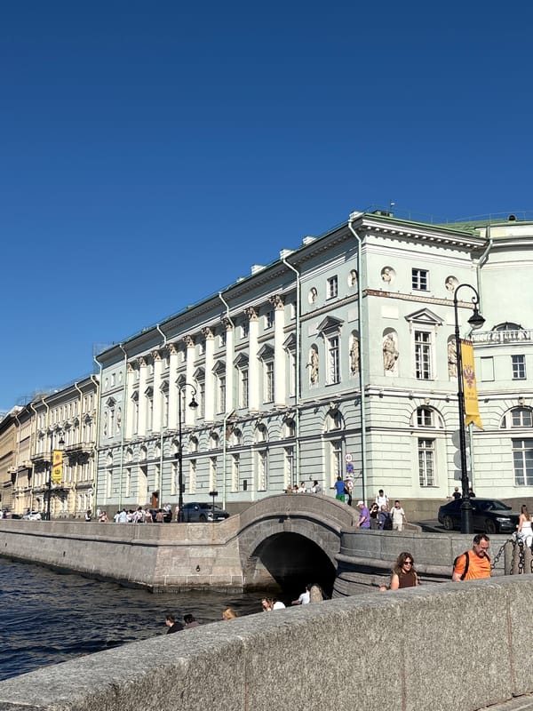 Tourist documents sunny afternoon tour of St. Petersburg landmarks