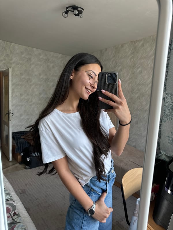 Woman takes mirror selfies in Sofia home
