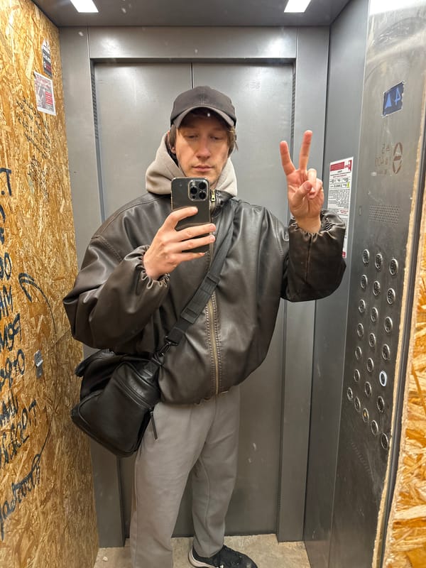 Person takes selfie in elevator in Russia